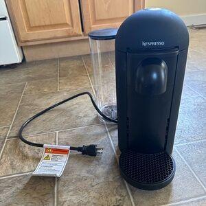 Nespresso vertuoplus machine with pods